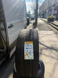 Close-up comparison of winter tyre tread and summer tyre tread on a car